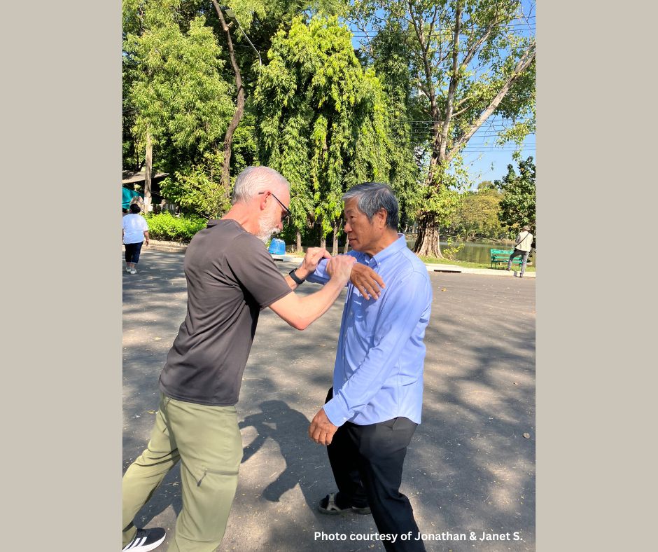 Testing Push Hands in Lumphini Park, Bangkok, Thailand.